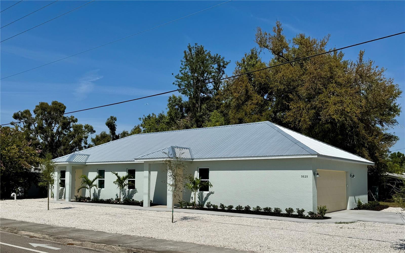 Seller will consider all reasonable offers! This beautifully designed, newly constructed home with Mother-in-law (ADU) is ideally situated in a central location, just minutes from the pristine Siesta Key Beach, the convenience of I-75, and the scenic Legacy Trail. Offering both luxury and functionality, the main home features an open floor plan with spacious living areas, perfect for entertaining or relaxing. High-end finishes, including stainless steel appliances, granite countertops, and elegant hardwood flooring, create a modern and welcoming atmosphere throughout.
What really sets this home apart is a fully equipped Mother-in-law apartment (ADU) with its own private entrance, ensuring comfort and privacy for guests, extended family or a tenant. The apartment is complete with a cozy living area, a well-appointed kitchen, a bedroom with ample closet space, its own laundry and a modern bathroom, offering the ideal blend of independence and convenience.
With its prime location offering quick access to Siesta Key's world-famous beaches, I-75 for easy commuting, and the beautiful Legacy Trail for outdoor activities, this home provides a perfect balance of style, convenience, and proximity to all that Sarasota has to offer.