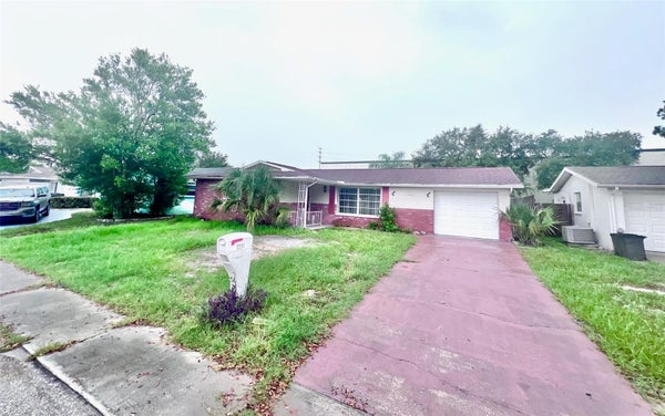 7204 ISLE DR, PORT RICHEY, FL 34668 - Image 2514b367f99c8a13562d3c5cdb6fa975/1664564425
