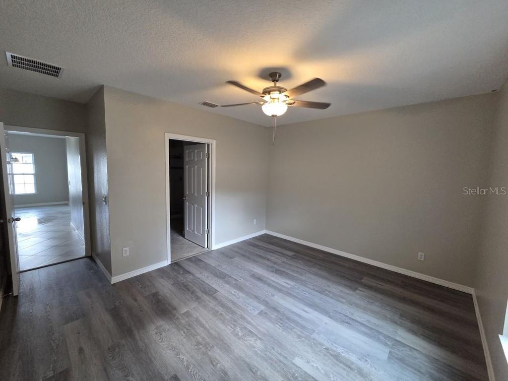 Photo of 228 Whispering Pines Way, Davenport, FL 33837 (MLS # A4669671)