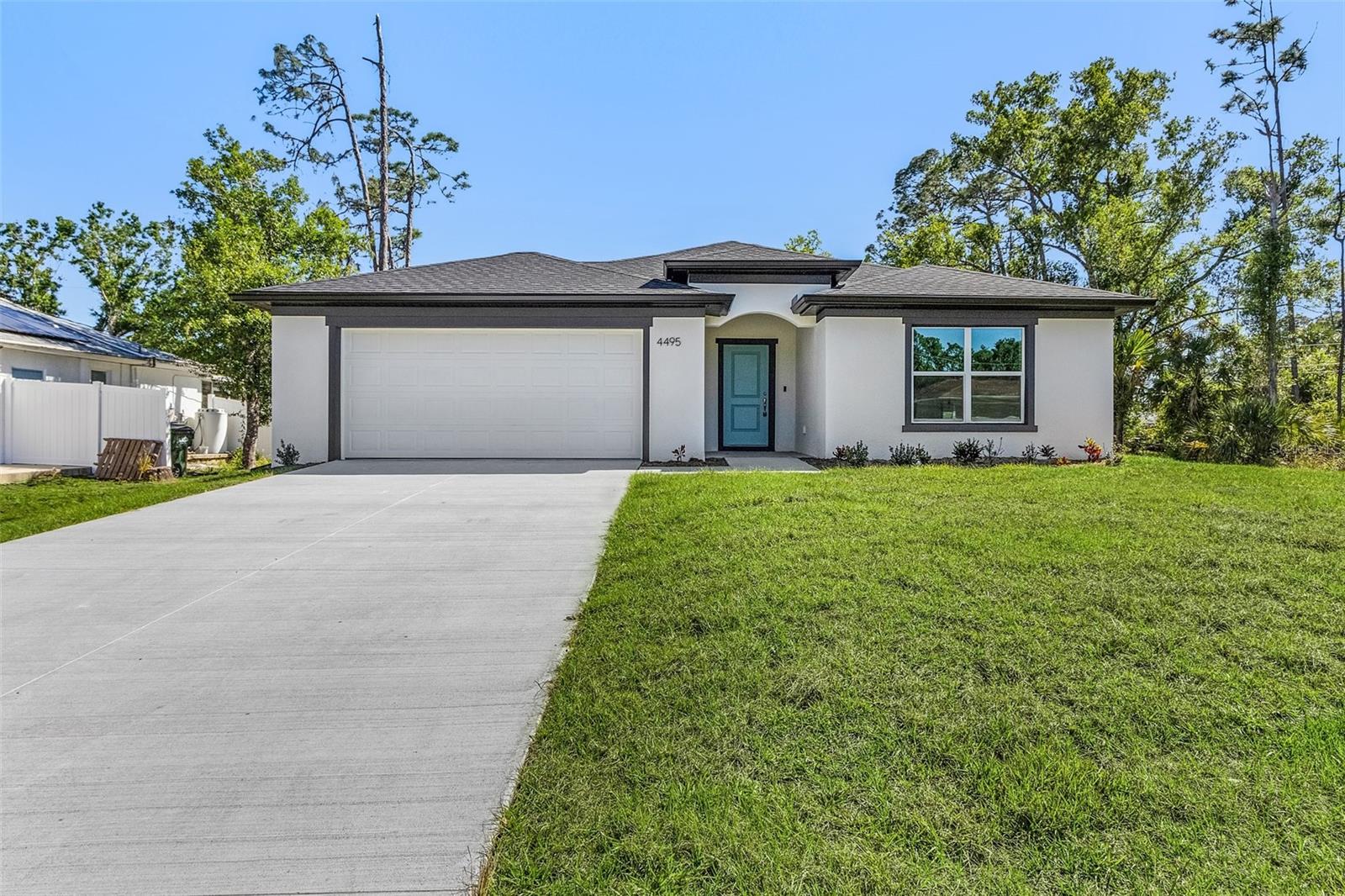 Inquire about our Builder Incentives available! This is the home you have been waiting for Brand-New construction 4-bedroom 2-bathroom home located in the thriving community of Northport! Standout features include waterproof and scratch resistant Mohawk Ballard flooring throughout (NO CARPET), Samsung stainless-steel appliance suite plus washer and dryer, and New Caledonia granite countertops throughout. The modern open floor plan is centered around the great room and kitchen with entertaining island, panty and subway tile backsplash. The owner's retreat showcases His & Hers walk-in closets and en-suite bathroom with floor to ceiling tile shower complete with glass enclosure. Guest Bedroom are all generously sized and share a centrally located guest bathroom. The covered back lanai is a perfect extension of the homes living space perfect for grilling or unwinding with family and friends. With proximity to I75, shopping, and dining this is the perfect place to call home. No need to wait as this home is ready for immediate occupancy! Call today for your private showing.