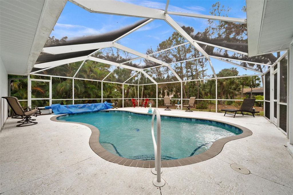 Photo of 840 Van Gogh Road, Englewood, FL 34223 (MLS # C7518868)