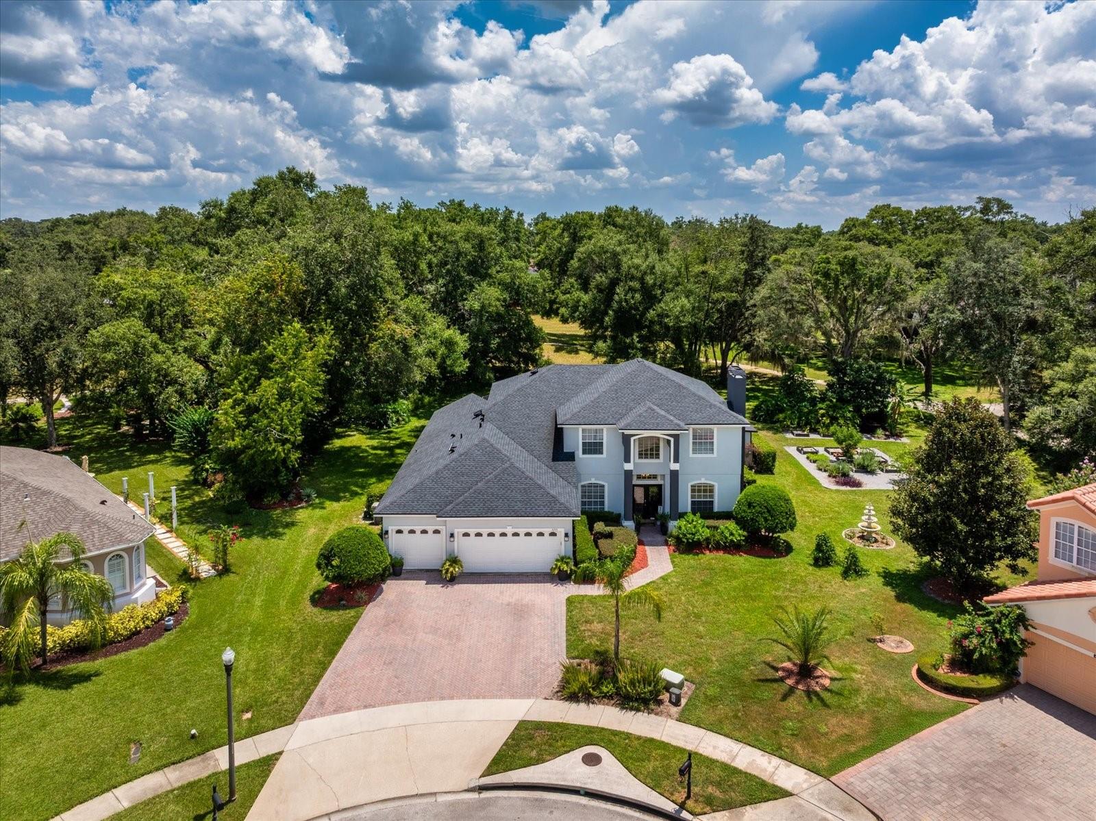 This stunning home awaits its new owner! Tucked away in a quiet cul-de-sac, this beautiful 5-bedroom 3 bath home with a large bonus room/ game room offers high-end design and thoughtful details throughout. From the gorgeous curb appeal to the stylish interior finishes, every inch of this property is a standout!
Enjoy custom touches like accent walls which include stacked brick, shiplap, and barn doors that bring texture and warmth to every room! The chef’s kitchen is a dream—complete with abundant cabinetry, an oversized walk-in pantry, and a custom built-in apothecary cabinet for extra charm and storage.
A hidden gem awaits just off the main living space: a private wine storage area with a secret door that leads to a gorgeous executive office—perfect for working in peace or impressing guests with your own speakeasy-style retreat.
The primary suite is truly oversized, large enough for a sitting area and designed for restful luxury. Step outside to your pavered lanai, outdoor fireplace, and sparkling pool—all overlooking the lush golf course! Enjoy this half an acre of privacy, complete with a lush herb garden adding a touch of farm-to-table freshness to your meals! More recent updates in this residence include: ROOF, 2 NEW AC UNITS, salt chlorinator, new pool pump motor, freshly painted inside and out!
Located in sought-after Rock Springs, just minutes from top-rated schools, golf, the 180-acre sports and amphitheater complex, and the upcoming Kelly Park corridor expansion with shopping, dining and so much more!
This home is a true masterpiece—schedule your private showing today!