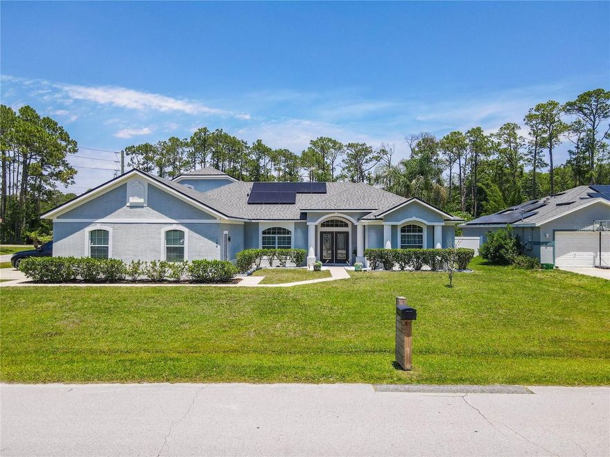 Your tropical dreams can now become your reality! This amazing POOL Home has everything for the perfect Modern Florida lifestyle. This beautiful well maintained -like new- pool home was built in 2014 on an overside corner lot. This home features 5 bedrooms, 4 bathrooms, and a lot of upgrades. Enjoy Florida outdoor living with fenced backyard for full privacy. Large Salt Pool with a built-in spa with a lot of room for seating, sunbathing, or entertaining. Bathroom entrance from the pool to the third bathroom. The heart of the home features a spacious gourmet kitchen with a big island, upgraded stainless steel deep kitchen sink, granite countertops, 42 in cabinets with crown molding, light inside the glass cabinets, under lighting, and plenty of storage, ideal for entertaining family and friends. Primary suite has a tray ceiling complete with a luxurious en-suite bath, jetted tub, separate shower with a rain shower, and generous hers and his closet spaces. All bedrooms are spacious. The upstairs bedroom has en-suite bathroom, and it’s been used as a Media room. Enjoy having 3-car garage and Circular Driveway. Very efficient house with leased solar panels and a propane tank. *** This house has a leased solar panel and propane tank. Roof, and pool salt system replaced 2025 Solar Panels leased in 2025. *** YOU MUST SEE! Schedule your showing today!