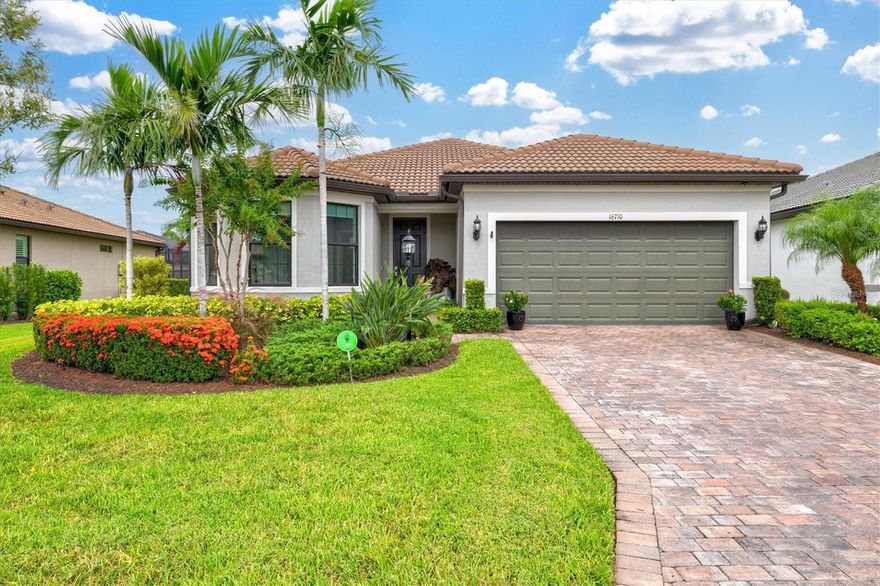 Discover the epitome of Florida living with this exquisite home, perfectly situated in the premier 55+ gated community of Del Webb in Lakewood Ranch. This meticulously maintained home, constructed in 2019 by the renowned Pulte Homes, features two spacious bedrooms, two elegant bathrooms, and a versatile den that can be customized to suit your needs. Pulte Homes is acclaimed for their commitment to quality and innovative design, and this home is no exception. It offers an impeccable fusion of refined finishes and modern practicality, all while capturing the essence of Florida’s vibrant charm. Upon entering the home, you'll be captivated by the open concept and spacious layout, highlighted by 10-foot ceilings that create a warm, inviting atmosphere filled with natural light. Noteworthy features include neutral ceramic tile flooring, exquisite designer lighting, custom blinds and draperies, a stunning brick accent wall, and high-impact windows. The chef’s kitchen is a true showstopper, boasting a remarkable amount of storage to keep all your culinary essentials within reach, complemented by sleek appliances, a centre island, and granite countertops. Custom-built shelving in the pantry and every closet throughout the home optimizes storage while ensuring everything remains impeccably organized. The dining and living rooms enhance this gathering area, providing a relaxed and comfortable lifestyle. Retreat to the primary suite, a gorgeous and tranquil room overlooking the lush tropical gardens of the backyard. It features a large walk-in closet with loads of custom cabinetry—your perfect dressing area or storage haven—and a large, beautiful ensuite bath with a walk-in shower and a double vanity, creating a spa-like atmosphere. A second bedroom is perfectly tucked at the front of the home with front garden views, next to your versatile den, perfect for a home office or another guest retreat, complemented with an adjacent stylish full bathroom. The newly fully fenced and private backyard provides a safe haven for pups to roam and play, while the covered, screened-in lanai invites you to relax in comfort, enjoying the stunning garden views in your perfectly landscaped private yard. The home also features a laundry room with storage and a two-car garage. To top all of this off, the HOA covers all lawn care, irrigation, fertilization and pruning- allowing for true low-maintenance living within a lush and mature landscape from the moment you enter the gates. This exceptional home combines expert craftsmanship and the vibrant spirit of Florida living. Living in Del Webb means embracing an active, engaging lifestyle with access to first-class amenities—think of it as your private resort! From a state-of-the-art 21,000 sq. ft. clubhouse and resort-style swimming pools and spa to an impressive fully equipped fitness centre, engaging social clubs, pickleball and tennis courts, dog park, and scenic walking trails, there are endless opportunities to stay lively and connected. Oh, and don’t forget about the full-service restaurant and bar- The Lakehouse. Del Webb’s warm and welcoming culture makes it easy to meet new friends, create lasting memories, and be part of a vibrant community within the nation’s #1 master planned community of Lakewood Ranch. Don’t let the chance slip away to claim this pristine home as your next home, where luxury seamlessly blends with convenience in the vibrant heart of Lakewood Ranch.