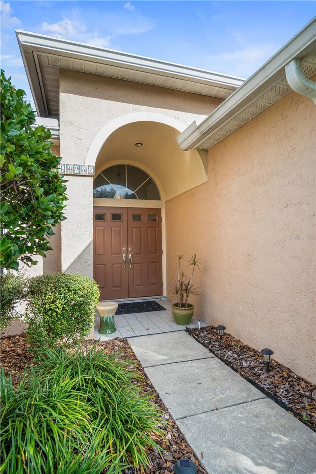 Photo of 14962 Faversham Circle, Orlando, FL 32826 (MLS # O6374240)
