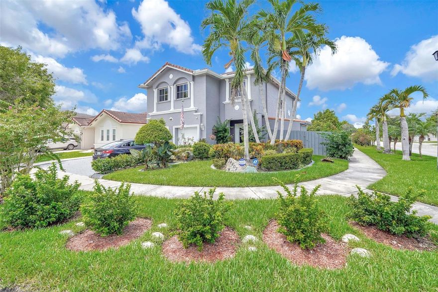 Sellers are motivated! Step into this stunning two-story residence nestled among mature landscaping in one of Miami’s most sought-after neighborhoods. Boasting 4 bedrooms, 3.5 bathrooms, and a thoughtfully designed layout, this home offers the perfect blend of modern elegance and functional living. The heart of the home is a gourmet, newly remodeled kitchen featuring sleek waterfall quartz countertops, custom built-in pantries, and top-of-the-line appliances—ideal for both everyday living and upscale entertaining. Soaring vaulted ceilings in the spacious living room create a light and airy ambiance, while large windows invite natural light and views of the lush exterior. Downstairs, you’ll find a convenient guest bedroom and a half-bath—perfect for visitors or a home office. Upstairs, the expansive primary suite offers a private retreat complete with three walk-in closets, spa-like ensuite bathroom featuring split double vanities, a jacuzzi tub, and a separate glass-enclosed shower. Two additional guest bedrooms share a well-appointed bathroom, and a second upstairs suite includes its own full bath and walk-in closet—ideal for multi-generational living or long-term guests. Step outside to your private backyard paradise—perfect for entertaining, with a covered patio, lush greenery, and mature fruit trees providing both shade and seasonal delights. Located within close proximity to top-rated elementary and middle schools, this home is perfect for families seeking quality education within minutes of home. With its ideal combination of luxury finishes, modern upgrades, and a flexible floor plan, this home is a true Miami gem. Don’t miss the opportunity to make it yours!