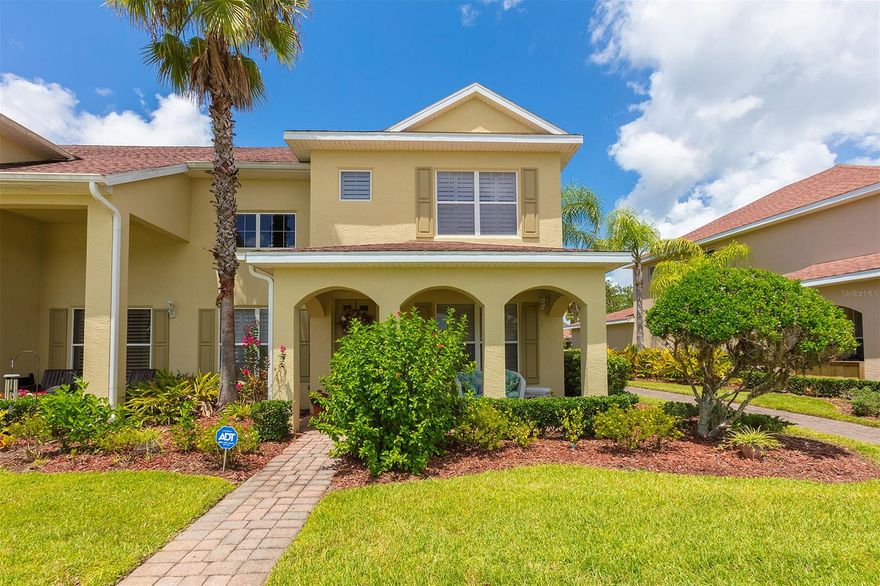 Convenient and care-free living awaits from this charming attached property nestled in the Parkside Townhomes section of Venetian Bay. A spacious open floor plan welcomes you as you enter, with one bedroom downstairs and beautiful plantation shutters throughout the residence. The updated kitchen provides wood cabinetry with stainless appliances and granite countertops. The master bedroom is oversized and features a dual-sink vanity in the master bath. Owners here enjoy the easy access to the community swimming pool, restaurants, shops, the spa and more. Come view today and secure your New Smyrna Beach retreat. ;Water: City