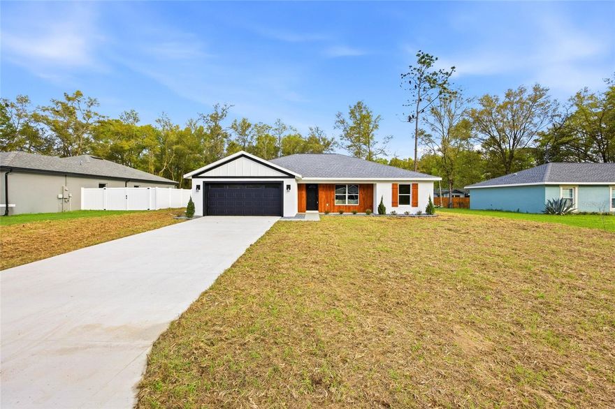 Unique Opportunity in a Prime Location!
You don’t come across finishes like this every day—designed for those who expect more than the standard.
Welcome to this beautifully crafted new construction home featuring 3 bedrooms, 2 bathrooms, and situated on a spacious 0.23-acre lot in the expanding community of Citrus Springs.
This thoughtfully designed home offers a bright open-concept layout with elegant, high-end finishes throughout. The modern kitchen showcases stylish cabinetry, quality countertops, and refined details that elevate both everyday living and entertaining. Natural light fills the home, highlighting the clean lines and contemporary design.
The primary suite provides a comfortable and unique retreat, highlighted by a spacious and beautifully designed bathroom featuring upscale fixtures, modern finishes, and a luxurious feel, along with ample closet space. Additional bedrooms gives you flexibility for guests, family, or a home office.
Located in a quiet and growing neighborhood, this property is conveniently near Citrus Springs Middle School and the Citrus Springs Community Center. Enjoy easy access to Pine Ridge, as well as major roadways including North Deltona Boulevard and U.S. Route 41, making commuting and daily travel simple.
Outdoor living is just minutes away, with the Citrus Springs Golf and Country Club only about 7 minutes from your doorstep.
This home combines modern style, functionality, and location—an excellent opportunity to own a brand-new property in one of Citrus County’s growing areas. Don’t miss your chance to make it yours!