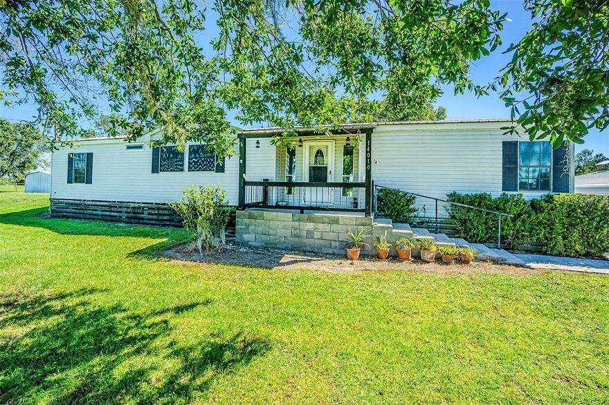New Listing – Private 5-Acre Retreat with Huge Rear Porch & 9,000 SF Pole Barn!

Tucked away in rural Hillsborough County, this secluded and peaceful 5-acre property offers the freedom of country living with room to spread out, unwind, and bring all your toys! Set back from the road down a deeded easement, this hidden gem includes a well-maintained 1994 manufactured home featuring 3 bedrooms, 2 baths, and over 1,700 square feet of living space — plus a massive 900+ square foot screened rear porch that runs the full 63-foot length of the home!

Upgrades & Highlights Include:

**Metal roof over both the home and lanai **Huge 16' x 63' rear porch with vinyl windows for year-round enjoyment **Cozy great room with wood-burning fireplace **Oversized kitchen with dark gray cabinetry, stainless steel appliances, a large prep island, and open views to the family and dining rooms **Split-bedroom floor plan for privacy:
• Owner’s suite on one side with ensuite bath, dual vanities, walk-in shower, and walk-in closet
• Bedrooms 2 & 3 + full bath & laundry room on opposite side with direct porch access

Outdoors, enjoy your private pasture views, a cozy firepit, and endless potential for recreation or relaxation. The showstopper? A 9,000 SF pole barn (built in 2007 – approx. $20K addition) offering incredible space for RVs, boats, trailers, storage, or workshop needs. Stop paying storage fees — park everything right at home!

Additional Features:  Lot dimensions: 246’ x 887’ (long 5 acres), Partially fenced with a stream running through the far south corner, Property requires flood insurance due to stream, but current premium is just $535/year, 2-car carport + plenty of guest parking, Peaceful, natural setting ideal for those seeking privacy, space, and a slower pace of life located just minutes from all the shopping you may need!!!