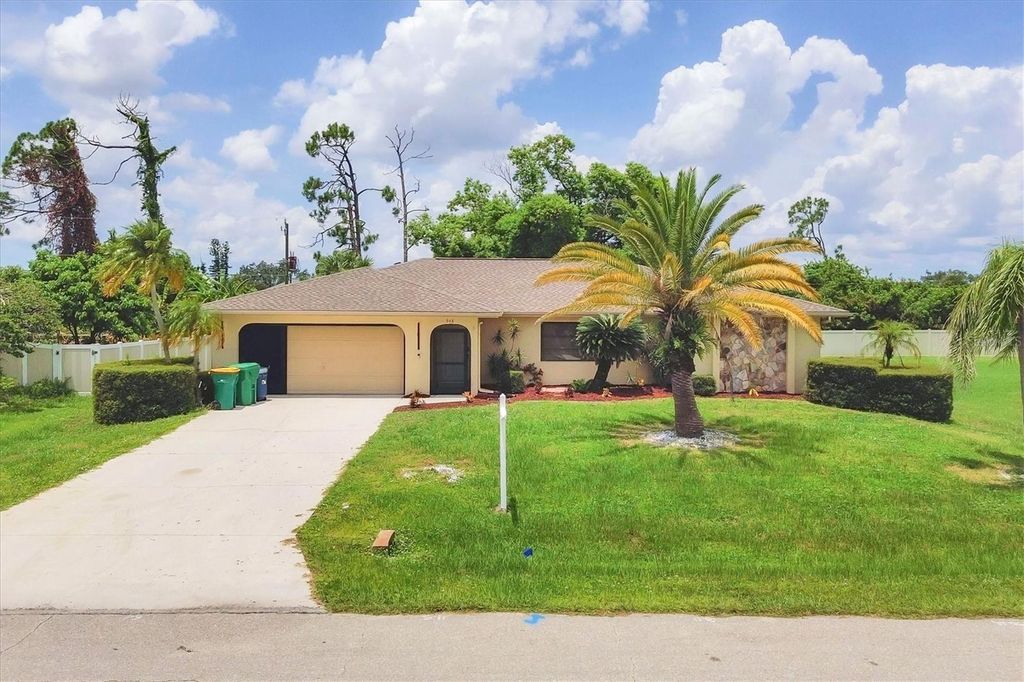 Photo of 948 Andrews Avenue NW, Port Charlotte, FL 33948 (MLS # D6143132)