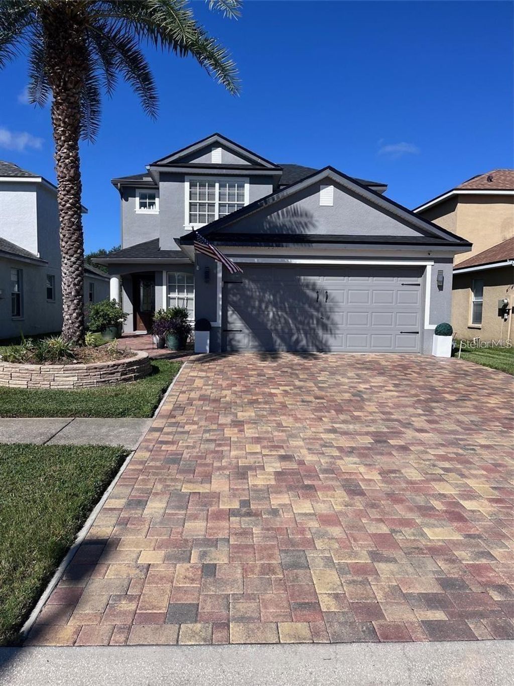 Photo of 5519 Turtle Crossing Loop, Tampa, FL 33625 (MLS # O6389790)