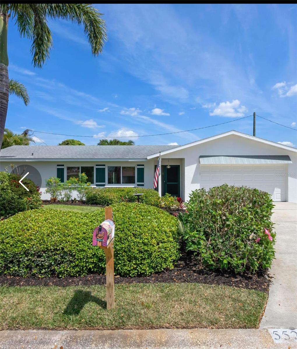 Motivated Seller!!!Wonderful home with a perfectly manicured yard, filled with flowering plants perfect for a large family orrental until you build your dream home. Fenced backyard with private paved RV or boat storage area. Freshly painted inside and out. Neutral color palette. Solar heated Pool is private and tropical with beautiful pavers aon the deck area. Garage has separate AC and Heating system! Top of the line Refrigerator in kitchen and washer and dryer. Hall bathroom shower has just been remodeled .All slider’s and windows have been replaced with the exception of the side glass next to front door. Shared irrigation well for sprinkler system! This is a wonderful home close to Siesta Key but in the coveted X flood zone. Kitchen cabinets have new soft close drawers and doors. Newer roof and water heater both 4 years old help make this a great value. Close to Detwilers, Publix and Siesta Key.