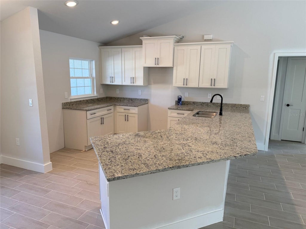 Photo of 132 Camillia Lane, Port Charlotte, FL 33954 (MLS # C7531905)