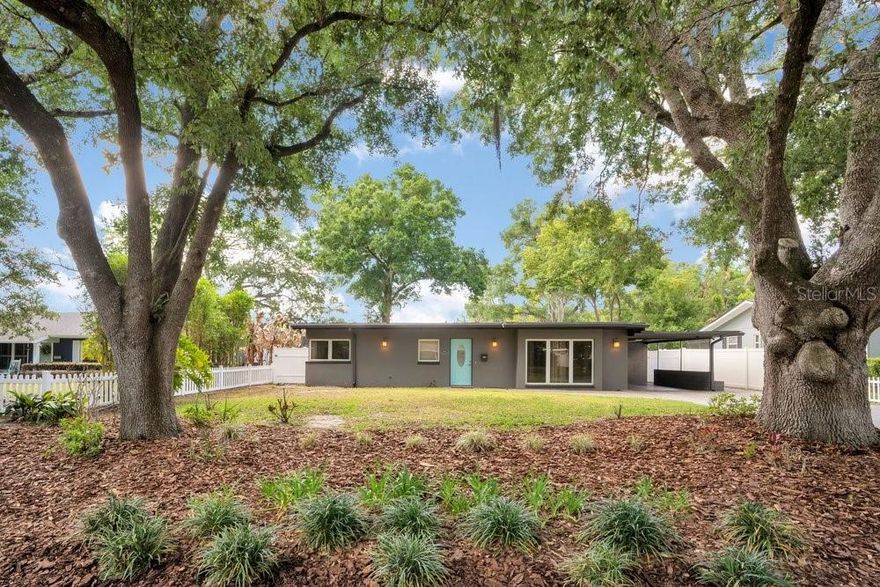 One or more photo(s) has been virtually staged. Charming three-bedroom, three-bath one-story home features a split floor plan with two primary suites, ideal for multigenerational living or guest flexibility, in a prime Winter Park location. In the desirable Park Manor subdivision, this beautifully designed split floor plan home offers comfort and privacy, perfect for modern living. Enjoy the freedom of no HOA, along with a layout ideal for families or entertaining. Midcentury modern-inspired design meets an open-concept layout with a spacious kitchen offering a large island, stainless steel appliances, pantry, granite countertops, full-height granite backsplash, and extensive cabinetry. The primary bath includes dual sinks and a frameless glass shower. Enjoy a large indoor laundry room and a private, oversized fully fenced backyard with a new paver deck and no rear neighbors. Ideal for outdoor living and entertaining. Additional highlights include a newly painted block shed with tin roof (2025) Zoysia grass installed in backyard, pavers installed in back, vinyl fence installed in backyard, GE refrigerator, washer and dryer, (2021) French doors in dining room and primary bath showerhead, (2020) Bosch dishwasher and (2018) Mitsubishi split air conditioner installed in primary bedroom and Mitsubishi split air conditioner installed in second bedroom. Just a short distance to the Winter Park YMCA, and minutes from vibrant Park Avenue, where you’ll find boutique shopping, the popular Winter Park Farmers' Market and a variety of top-rated dining options. In a sought-after school district, Lakemont Elementary, Maitland Middle and Winter Park High. This home combines location, lifestyle and convenience, making it a rare opportunity in one of Central Florida’s desirable communities.
