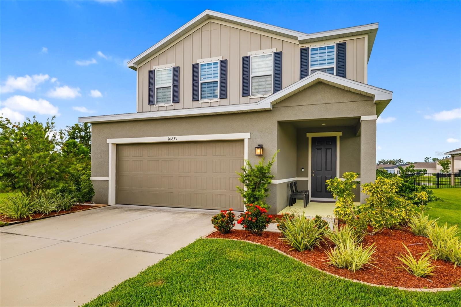 One or more photo(s) has been virtually staged. Opportunity Knocks – Assumable Mortgage at 2.75%! $290,000 assumable mortgage available – truly priceless in today’s market. This 4 bedroom, 2.5 bath home is perfectly designed for modern living, with a bonus room upstairs plus a flexible office/den to fit your needs.
Premium Lot & Unmatched Views. Nestled on a prime homesite with no neighbors behind, in front, or on one side, this property offers rare privacy and tranquility. Enjoy the unobstructed, stunning water views, Preserve backdrop behind and in front, A peaceful setting with nature as your closest neighbor. Bright, Open & Move-In Ready. Meticulously maintained and filled with natural light, this home features: Open, airy layout perfect for entertaining. Chef’s kitchen with granite countertops and upgraded appliances. Beautifully appointed window treatments throughout. Resort-Style Living at Summerwoods. Located in the heart of Parrish, minutes to I-75 for an easy commute to Sarasota, Tampa, and St. Pete, Summerwoods offers a vibrant, family-friendly lifestyle with a Resort-style pool & splash pad, Playground & dog park, Walking trails for outdoor enjoyment. Regular food trucks, community events, and social gatherings.? This home isn’t just a place to live—it’s a lifestyle. Move in, unwind, and enjoy everything Summerwoods has to offer.