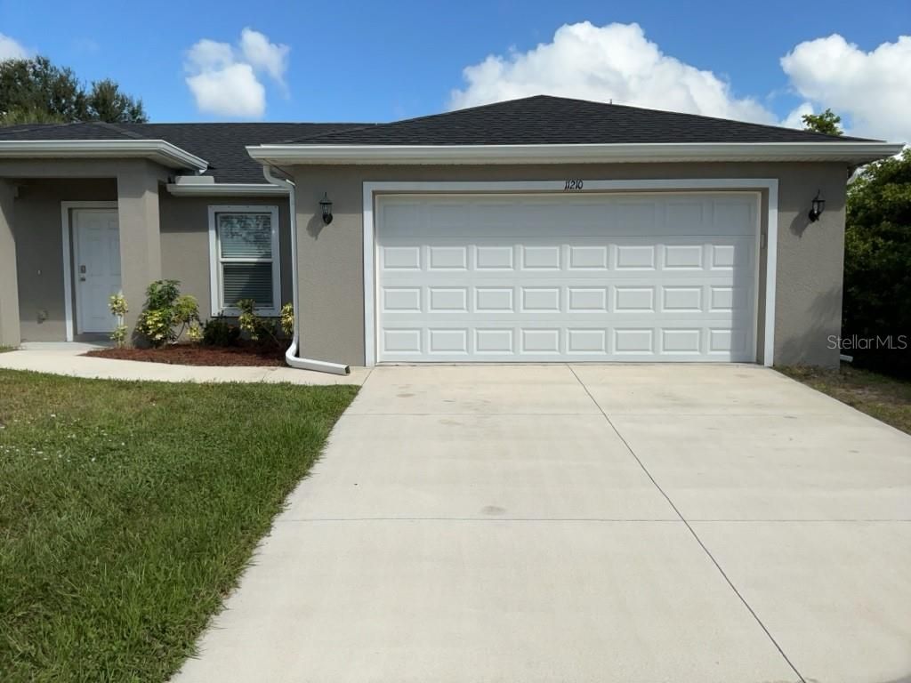 Photo of 11210 Rockwell Avenue, Englewood, FL 34224 (MLS # OM711787)
