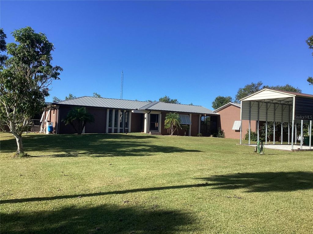 Photo of 30110 Loblolly Pine Drive, Punta Gorda, FL 33982 (MLS # C7516514)