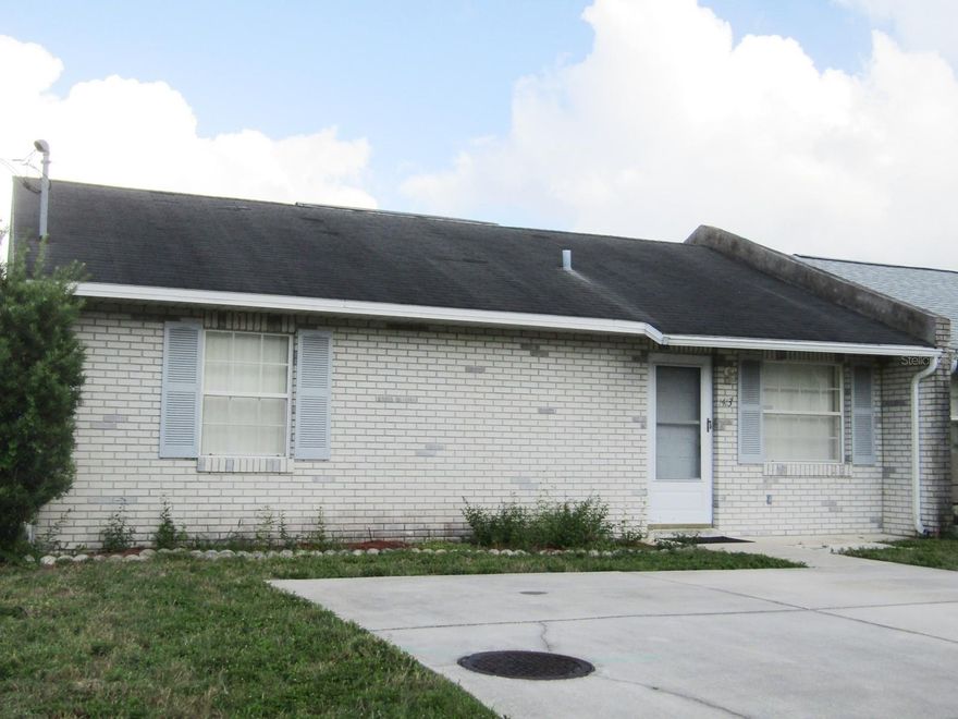 Location, Location, Location!! If you are looking for the perfect place to enjoy the Florida winters, this is it! Great size @ just under 900sf. This is 1/2 of a duplex...offering 2 bedrooms/2 baths, open concept living/dining/kitchen and spacious screen enclosed back porch! Just minutes to shopping, doctors and easy access to highways north and south! Brand new roof just installed!  Check it out today this quiet 55+ community, before it's gone!!