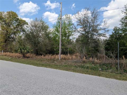 Photo of 7711 SE 126th Place, Belleview, FL 34420 (MLS # OM654132)