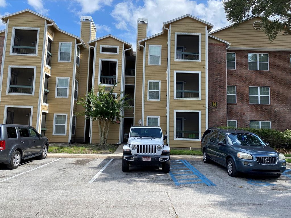 Photo of 5600 Devonbriar Way #206, Orlando, FL 32822 (MLS # O6395228)