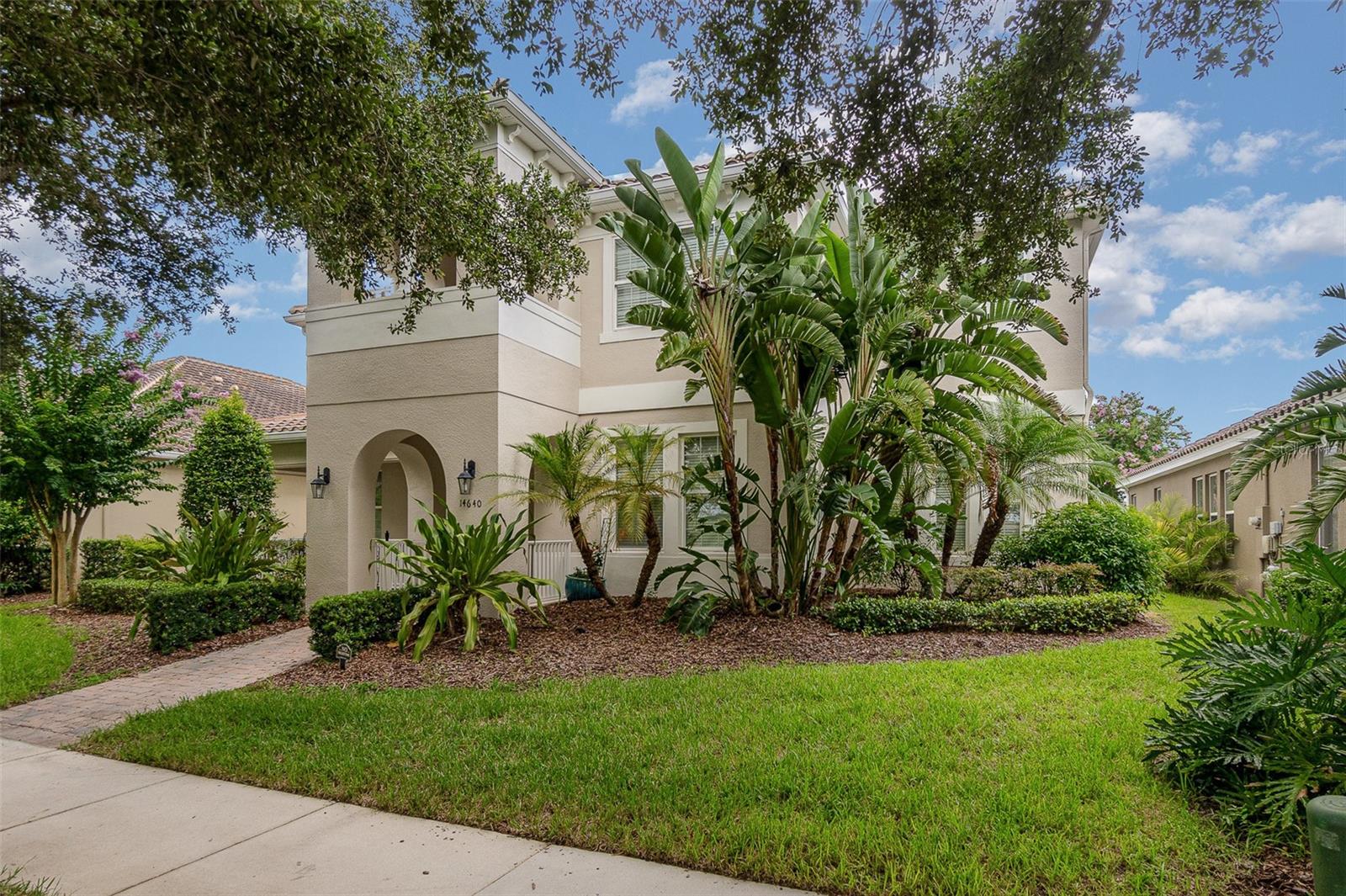 One or more photo(s) has been virtually staged. Welcome to 14640 Porter Rd located in Summerlake in the heart of Hamlin.
This spacious 5-bedroom home offers over 4,000 sq ft of smart, functional living—including two offices, and 4.5 bathrooms
Walking in you are welcomed by the generous living room, and a large island kitchen. The chef’s kitchen is a dream, with a gas cooktop, built-in oven and microwave, large island, walk-in pantry, refrigerator and dishwasher. The first floor includes two dedicated office spaces, a bedroom with full bath, and beautiful custom trim work throughout.
Upstairs includes a large loft, four bedrooms + three bathrooms, and a laundry room with cabinets, sink, and hanging rack. The primary suite features a private sitting area, a HUGE walk-in closet with custom built-ins, and a spacious bath with soaking tub and separate vanities. All walk-in closets (except one in the house) are upgraded with custom storage.
Outside, the fully fenced backyard is a private oasis—complete with a stunning paver patio and a built-in stone fireplace, perfect for entertaining or quiet nights by the fire. Gutters are already installed, and there’s a top-of-the-line Kinetico water softener system, plus a 50-amp electric car charger in the oversized 3-car garage. Located in the amenity-rich Summerlake community, you’ll enjoy resort-style living with access to a pool, gym, walking trails, playgrounds, tennis courts, and more—all just minutes from Disney and Hamlin Town Center.