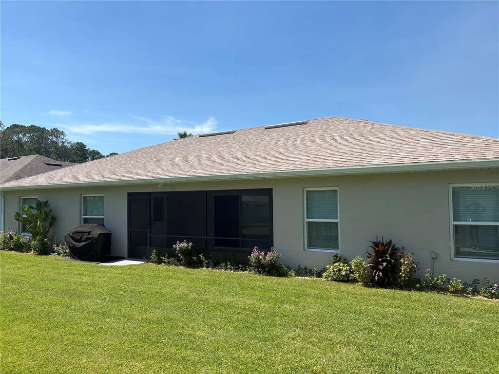 Photo of 53 Eric Drive, Palm Coast, FL 32164 (MLS # FC320244)