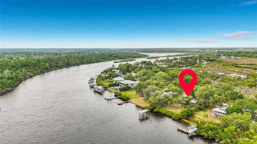 **RARE RIVERFRONT OPPORTUNITY ON THE LITTLE MANATEE RIVER!** Discover the possibilities in Ruskin! Situated on a beautiful stretch of the Little Manatee River with approximately 100 feet of river frontage and set on 0.36 acres, the true highlight of this property is the incredible riverfront setting, breathtaking backyard views, endless privacy, and the potential it has to offer. Imagine starting your day with peaceful river views and morning sun filtering through the palms, while enjoying cooler, shaded afternoons in your own private backyard retreat filled with serenity and natural beauty. With direct river frontage, this property is a true nature lover’s retreat—perfect for kayaking, fishing, boating, and enjoying the Florida waterfront lifestyle. The property currently features a 3-bedroom, 1-bath home, while also offering incredible opportunity for buyers looking to personalize, enhance, or create their own vision for waterfront living over time. Whether you’re dreaming of a custom-built waterfront home, a private retreat, or a weekend getaway away from the everyday, the possibilities here are endless. Tucked away yet conveniently located near major roadways, shopping, and dining, you get the best of both worlds—privacy and accessibility. If you’ve been searching for a waterfront property with incredible views, serenity, and endless potential, this is one you won’t want to miss!