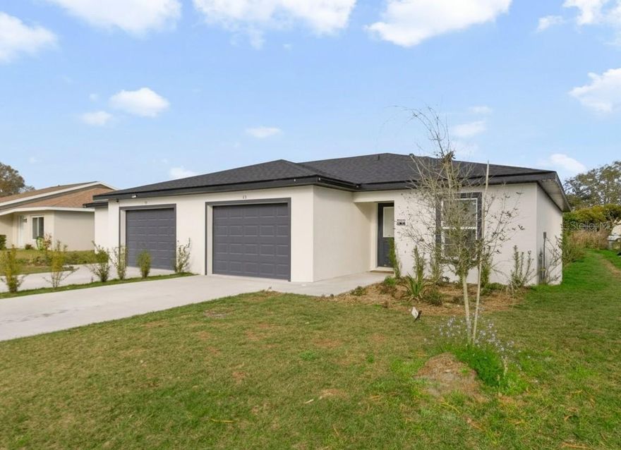 Welcome to Circle Park – where location, value and a 2025 BUILT HOME come together in this SINGLE STORY half duplex with NO HOA! Thoughtfully designed with an ideal OPEN CONCEPT layout delivering spacious living and kitchen areas perfect for everyday living or entertaining family and friends. The practical layout has SPLIT BEDROOMS for added privacy – your PRIMARY SUITE features a dedicated en-suite bath and WALK-IN CLOSET, while bedrooms two and three share a second full/guest bath. You will also enjoy the convenience of the 1-CAR GARAGE. Whether you are a FIRST TIME BUYER, downsizing or investing, this property delivers. Located just off I-95 and Garden Street for easy access to shopping, dining, recreation and area schools. You are also just minutes from US-1, the Indian River, local beaches and the Kennedy Space Center making this a perfect home base for work or play. **INVESTORS TAKE NOTE: both sides (85/95) are available for sale, offering excellent potential for rental income or multi-generational living. Don’t miss your chance to own a practically new home with no HOA in one of Titusville’s most convenient neighborhoods. Call today for more info and schedule a tour! **Seller may consider buyer concessions if made in an offer**