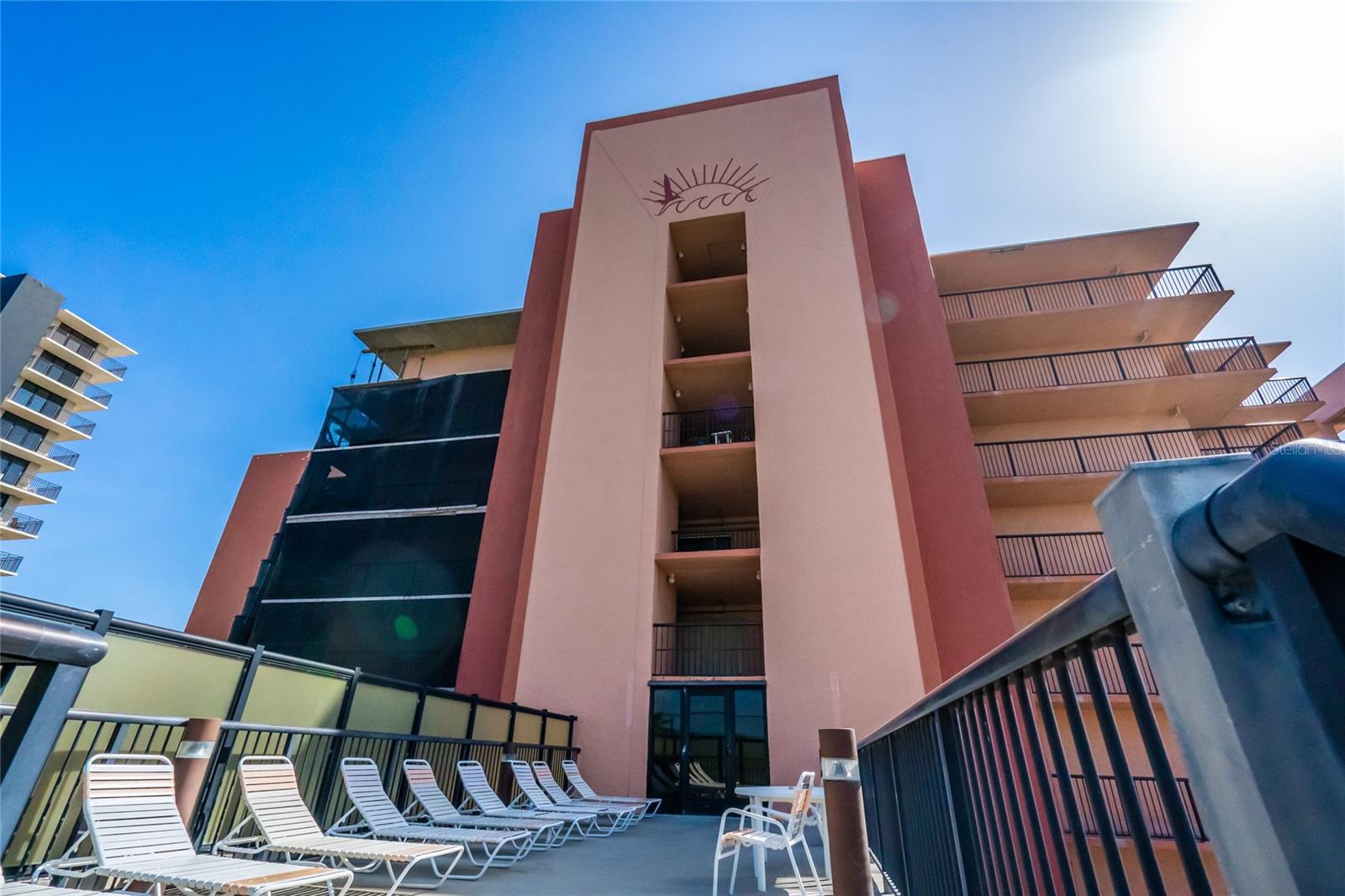Experience the ocean breeze and salt air while you immerse yourself in the captivating views of the blue-green waters and sugar sands of New Smyrna Beach as you relax on your private balcony, a special feature to enjoy some alone time or entertain guests and family. This Condo is a 2 bedroom, 2 full bath Condo. Master has King bed, 2nd room has 2 twin beds. Laundry in Condo.
This Sunrise Condo is equipped with all the modern amenities- high-speed internet/ WiFi, flat-screen TVs, a fully stocked kitchen with all the essentials, bed and bathroom linens, washer & dryers, and a private balcony illuminating the breathtaking views from both the master suite and main living area.
Sunrise amenities include a beautiful seasonally heated pool, an oceanfront sundeck, tennis courts, shuffleboard courts, pickleboard courts, basketball courts, two-level parking garage and gas grills for cookouts. The complex is located on the no-drive section of the beach, offering miles of seashore to explore with a nice stroll or by bike.
The open floor plan and countless amenities make this luxury beachfront condo the perfect stay for your vacation!
Enjoy all New Smyrna has to offer including shopping and dining, kayak and paddle board tours, Art galleries, The Marine Discover Center, the New Smyrna Beach Museum, Sugar Mill Ruins and the Eldora House at the Canaveral National Seashore, inshore and offshore fishing, surfing, golf courses, The Canaveral National Seashore, it also features one of the longest stretches of pristine beaches in the United States. New Smyrna is also just miles from all the major attractions ... Disney, Universal, Sea World, Magic Kingdom, Hollywood Studios, Animal Kingdom, Legoland, Epcot, and Historic St. Augustine to name some.