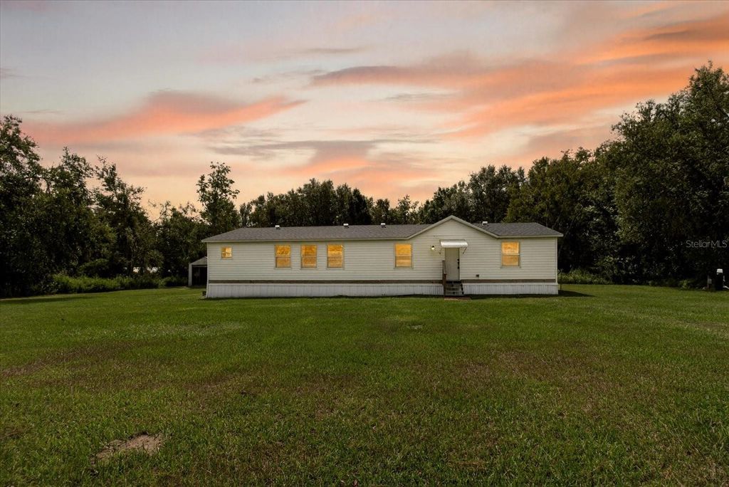 Photo of 31326 Tyndall Road, Wesley Chapel, FL 33545 (MLS # TB8431812)