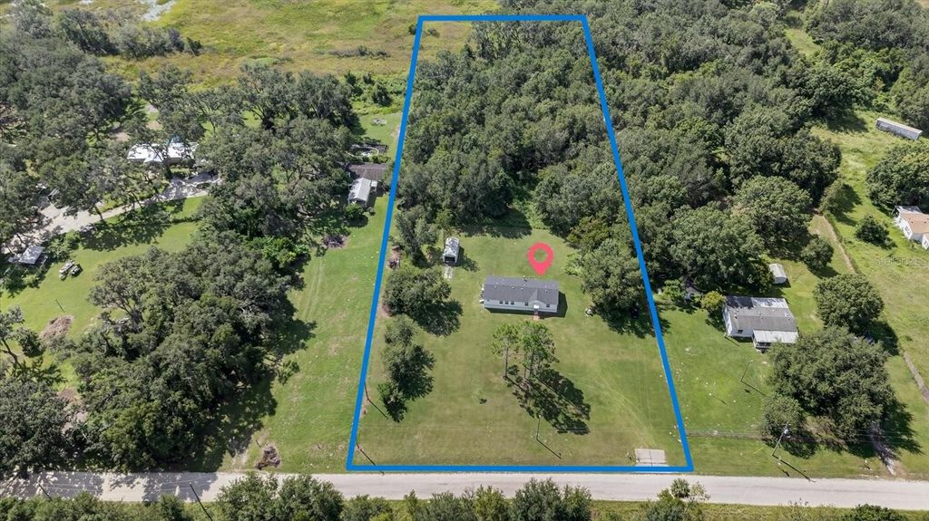 Photo of 31326 Tyndall Road, Wesley Chapel, FL 33545 (MLS # TB8431812)