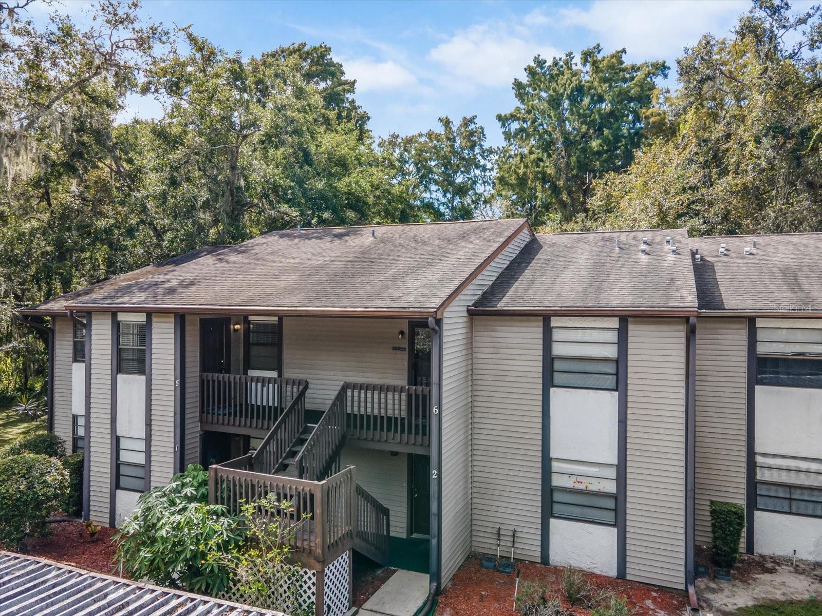 Peaceful Pond Views and Serene Living!
Welcome home to this spacious 3-bedroom, 2-bath second-floor condo offering stunning views of the pond, manicured lawn, and surrounding conservation area. Enjoy the tranquility of nature right from your living room, 2nd, and 3rd bedrooms, each providing beautiful vistas and abundant natural light. The screened and covered patio—accessible from both the living room and 3rd bedroom—is the perfect place to unwind with morning coffee or evening breezes.
The flexible 3rd bedroom is ideal as a home office or art studio, with sliders that fill the space with sunlight and bring the outdoors in. Inside, both bathrooms have been thoughtfully updated with granite counters and custom tile showers, offering a modern touch, while the home is priced to allow you to design your dream kitchen. The kitchen already features newer stainless steel appliances, a convenient pantry, and a pass-through window with breakfast bar to the dining room for easy entertaining.
The primary bedroom boasts a private en-suite bath and a spacious walk-in closet. A welcoming ceramic-tile foyer with large storage closet sets the tone as you enter. The hallway hosts the utility and laundry closets, with HVAC and water heater replaced within the last 5 years for peace of mind.
Residents enjoy an active, friendly community with assigned covered parking, exterior storage closet, clubhouse with library, billiards, crafts area, swimming pool, tennis courts, and shuffleboard—all nestled among beautifully maintained green spaces that preserve a natural, open feel throughout the neighborhood.
Come experience easy living with beautiful views, modern updates, and endless potential to make it your own!