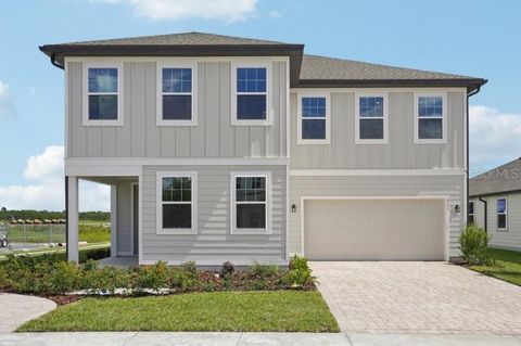 Photo of 711 Junonia Blvd, New Smyrna Beach, FL 32168 (MLS # TB8408871)
