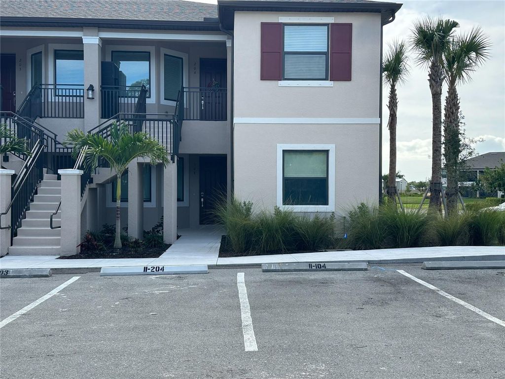 Photo of 23819 Collina Way #104, Port Charlotte, FL 33980 (MLS # D6145200)