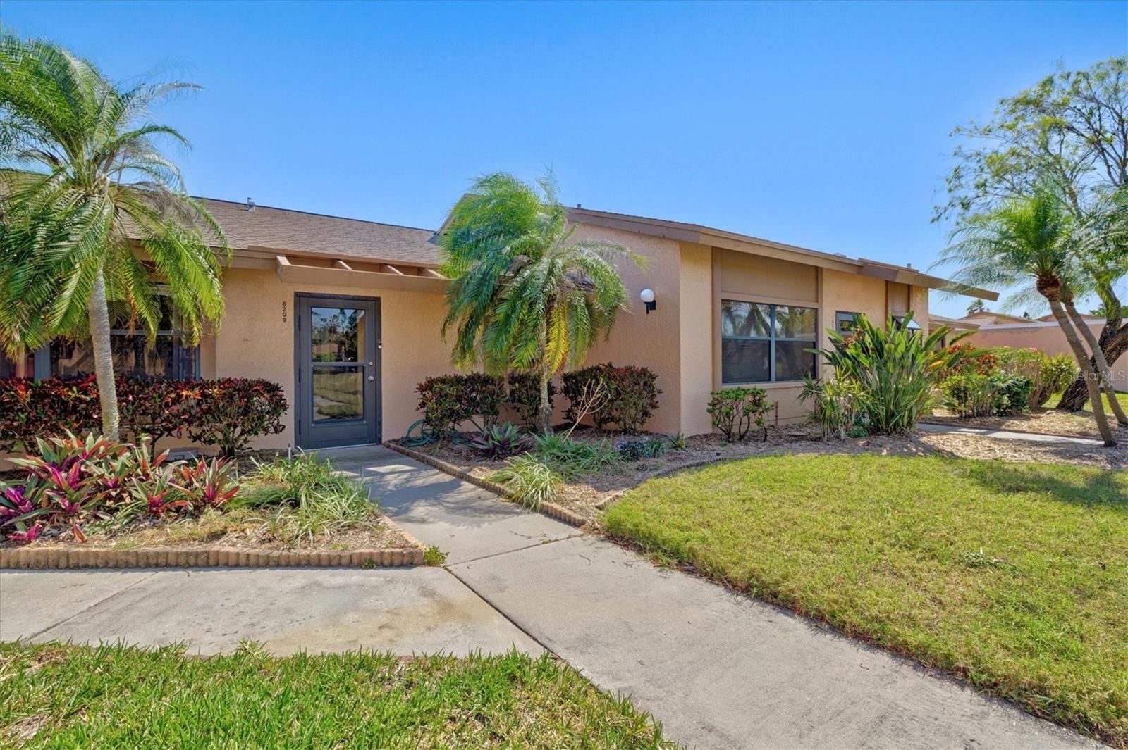 Live Where Others Vacation! Your FLORIDA OASIS awaits at this FULLY FURNISHED and UPDATED 2-bedroom, 2-bath villa overlooking the POND and tucked away in the highly desirable 55+ community of Meadowcroft South. Just minutes from the sugar-white sands of Anna Maria Island and the vibrant energy of downtown Bradenton, this spacious 1,248 sq. ft. condo offers the best of Florida living without the high price tag. From the moment you step inside, you’ll feel right at home. FRESHLY RENOVATED with LUXURY VINYL PLANK flooring, NEW stainless steel appliances, updated kitchen countertops, and FRESH PAINT throughout, this villa is MOVE-IN READY and thoughtfully designed. The living room features VAULTED CEILINGS and a bright, airy atmosphere, making it a perfect space for relaxing or entertaining guests with ease. The OPEN LAYOUT flows seamlessly into a SCREENED lanai, where you can relax and take in peaceful pond views with a sparkling fountain; the perfect spot for your morning coffee or evening happy hour. The Owner's Suite offers plenty of space for a king-sized bed and is flooded with NATURAL LIGHT. The guest bedroom is equally inviting, with ample closet space, ideal for hosting friends and family. Other recent updates include HVAC (2021), roof (2020), and water heater (2014), providing worry-free living for years to come. But the home is only the beginning. Meadowcroft South is known for its friendly, active atmosphere and well-maintained grounds. Enjoy access to a heated community pool, heated spa, clubhouse, and a packed calendar of social events, fitness classes, and group activities. Whether you're into morning walks, game nights, or relaxing by the water, there’s something for everyone here. And when you’re ready to explore, you're just minutes from local shopping, medical centers, restaurants, golf courses, and the world-famous beaches of the Gulf Coast. Downtown Bradenton, with its riverwalk, art scene, and farmers markets, is just a short drive away - offering endless opportunities for dining, culture, and entertainment. Whether you're looking for a seasonal escape or a full-time retreat, this villa is your gateway to easy living in one of Bradenton’s most welcoming 55+ communities.