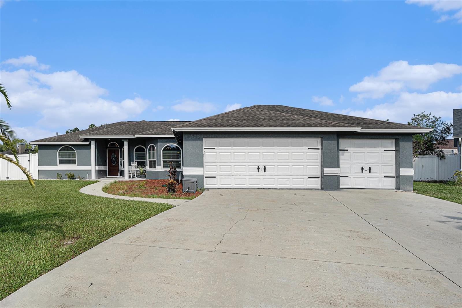 Welcome home to your beautifully maintained 4-bedroom, 2-bath home with a 3-car garage that checks all the boxes for Florida living! Tucked away in a quiet cul-de-sac, this home offers the perfect blend of comfort, privacy, and convenience. Step inside and you’ll immediately feel at home with its spacious layout designed for both relaxation and entertaining. The split-bedroom floor plan provides privacy, while the open living areas create a warm and inviting flow. Outside, enjoy your fully fenced backyard—ideal for pets, and weekend gatherings. The detached shed adds extra storage space for all your tools, toys, or hobbies. With a 3-car garage, you’ll have plenty of room for vehicles, a workshop, or even your next project. Whether you’re commuting into Tampa, enjoying nearby parks, or exploring the amazing dining and entertainment Lutz has to offer, this location is hard to beat. Don’t miss your chance to make this house your new home!