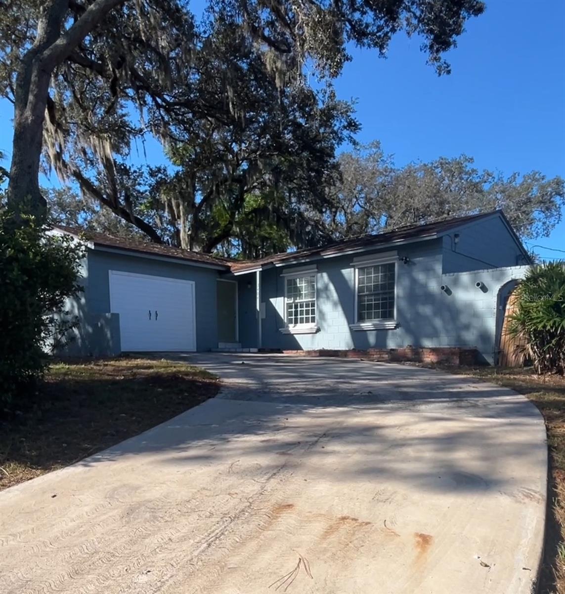 Lovely 3-bedroom, 2-bath home with NO HOA and a 1-car garage converted into a versatile flex room that can serve as an in-law suite, office, gym, or guest space! This bright home offers plenty of natural sunlight throughout. Enjoy the enclosed porch overlooking a large, fenced backyard with endless possibilities for outdoor living or future expansion. The spacious driveway accommodates 4+ cars, perfect for gatherings or extra parking. Conveniently located near Orlando, airport, shopping, dining, and major highways. This home offers great potential — make it your own!