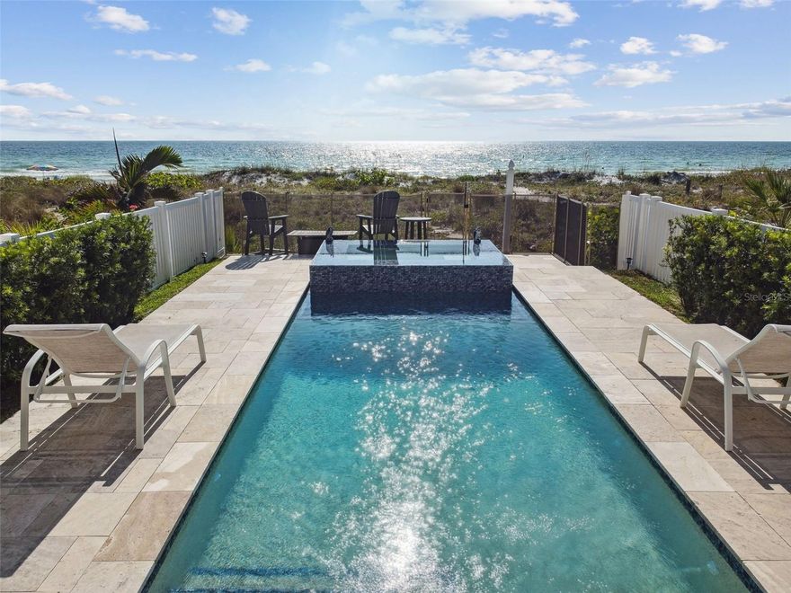 Stunning panoramic ocean views from this timeless contemporary beachfront oasis in the heart of Indian Rocks Beach. This beachfront
paradise has undergone extensive renovation since 2022. The list of considerable upgrades includes 2023 new metal roof, painting inside and out, hurricane windows and sliding doors, 1st floor storm shutter, water softener, garage floor resurfaced, garage door opener, brick paver driveway, ADT alarm system with security camera system, outdoor sound system, heated saltwater pool with jacuzzi with bluetooth controls operated from your cell phone, beachside pool shower, sprinkler system hooked into reclaimed water from the city, fencing and landscaping with Saint Augustine sod, travertine tile throughout property and pool deck, custom baseboards, new LED lighting, 72 inch ceiling fans, ceramic tile planking, marble tile in bathrooms, calcutta quartz granite, sinks and faucets, freestanding bathtub
master bath, bathroom cabinets/vanities, custom automatic blinds, custom master bedroom closet, marble tile fireplaces, garbage disposal, and electrical outlets and switches. It comes with three bedrooms, four bathrooms, and 2,610 square feet of thoughtfully designed living space, not to mention endless stretches of outdoor areas that take advantage of that view. Awash in natural light, the interiors were designed for entertaining. The first of three levels feature your convenient two-car attached garage and bonus room with a full bath. Sliding glass doors open to the main outdoor sundeck with new heated saltwater pool and jacuzzi complete with outdoor shower. Beyond that is the the white sand beaches of Indian Rocks where you’ll revel in the magnificent sunsets every night. On your second level is the open chef’s kitchen and family room with marble fireplace that are perfect for gathering with friends and family and seamlessly connect to the covered view terrace. This floor has a bedroom, and bathroom too. On your third level is the spacious and inviting master suite with fireplace,
sitting area, custom closet and sliding doors that open to your private covered terrace. Your dream master bath retreat features a  freestanding bath uniquely designed to have a view of the water. The third bedroom with full bath completes the top level space. All showcasing breathtaking panoramic ocean views. This is a deeded single-family home with no HOA and you own the 25 x 145 lot that is complete with a large driveway for ample parking. Rental period is 30 days minimum. This extraordinary home needs to be seen to be believed, get in touch today to arrange a viewing.  Please watch the video tour.