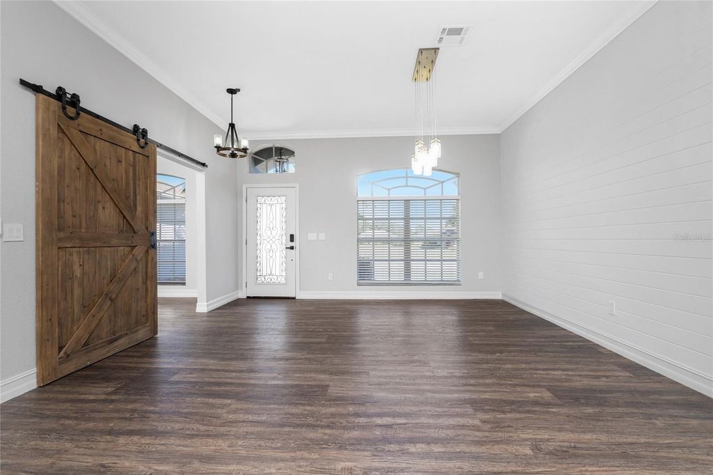 Photo of 686 Rotonda Circle, Rotonda West, FL 33947 (MLS # D6145903)