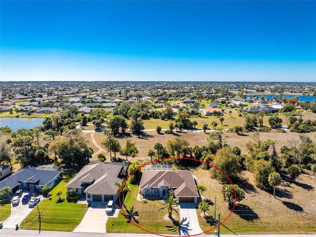 Photo of 686 Rotonda Circle, Rotonda West, FL 33947 (MLS # D6145903)