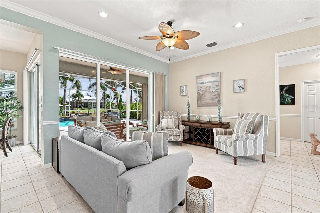 Photo of 136 Peckham Street SE, Port Charlotte, FL 33952 (MLS # C7529713)