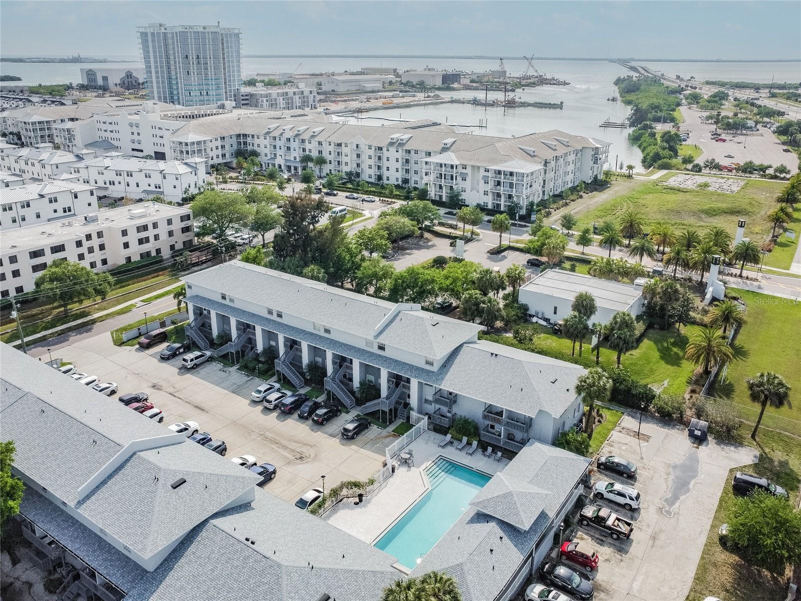 WELCOME TO YOUR COMPLETELY REDONE CONDOMINIUM IN PRIME LOCATION!! WESTSHORE MARINA IS THE ULTIMATE NEIGHBORHOOD WITH ITS RESTAURANTS SHOPPING AND ENTERTAINMENT. This MODERN TWO LEVEL unit has been completely renovated top to bottom. GORGEOUS new KITCHEN complete with NEW DISHWASHER, MICROWAVE, NEWER APPLIANCES. Brand NEW AC SYSTEM and WATER HEATER 2025. Includes 2025 WASHER/DRYER inside the unit. TWO BATHROOMS completely redone, one upstairs and half bath downstairs. LARGE and OPEN living spaces. New MODERN LIGHTING. New SHELVING in ALL CLOSETS and PANTRY. SCREENED IN PATIO for outdoor relaxing and dining. ASSIGNED PARKING conveniently located directly in front of the unit. LARGE EXTRA STORAGE UNIT included and conveniently located adjacent to the front door. ENJOY the beautiful POOL maintained immaculately right outside your front door. Get to St Pete and Clearwater beaches in no time! PRIME location in South Tampa with easy access to Tampa International Airport, MACDILL AFB, SELMON Expressway, Pinellas County, DOWNTOWN/WESTSHORE BUSINESS DISTRICT. INVESTOR'S DREAM... Great opportunity for rental income immediately as it is currently leased until January. HOA COVERS WATER, SEWAGE, TRASH, GROUNDS, POOL, PEST CONTROL, BUILDING MAINTENANCE, INSURANCE, and more. Call agent for details and showing, this won't last!