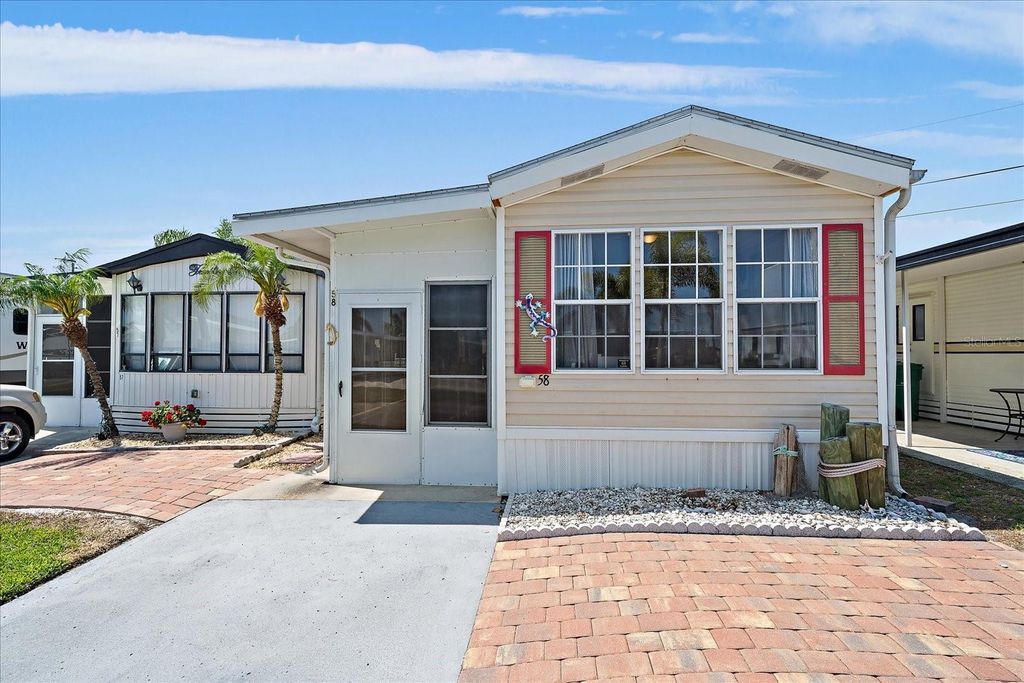 Photo of 58 Montego Drive, Palmetto, FL 34221 (MLS # A4609808)