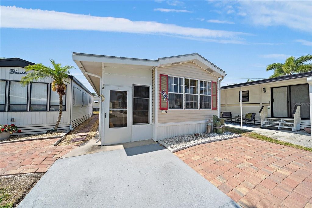 Photo of 58 Montego Drive, Palmetto, FL 34221 (MLS # A4609808)