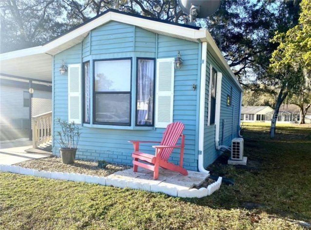 Photo of 610 Cottage Park Lane, Leesburg, FL 34748 (MLS # G5107513)