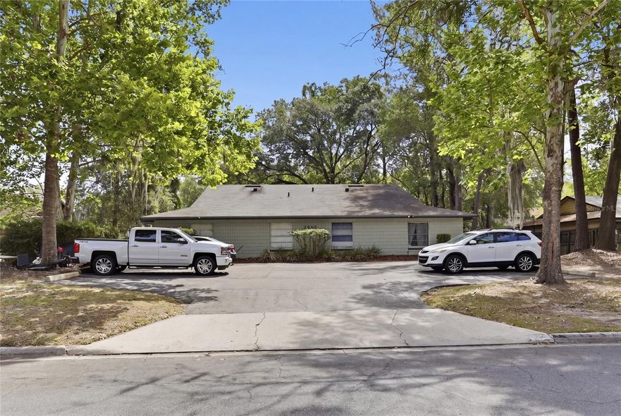 Incredible investment opportunity just minutes from UF Campus and UF Health!  This property has rented consistently for the last 30 years. Inside, each unit features two spacious bedrooms and one bath. The kitchens are spacious with plenty of cabinet space, refrigerators, electric ranges, and dishwashers There is a laundry closet just off of the kitchen that has full size washer and dryer hookups. The living room is open and spacious. There is durable ceramic tile throughout all of the common areas. Appointments required (prefer 48 hour notice) as all units are occupied.