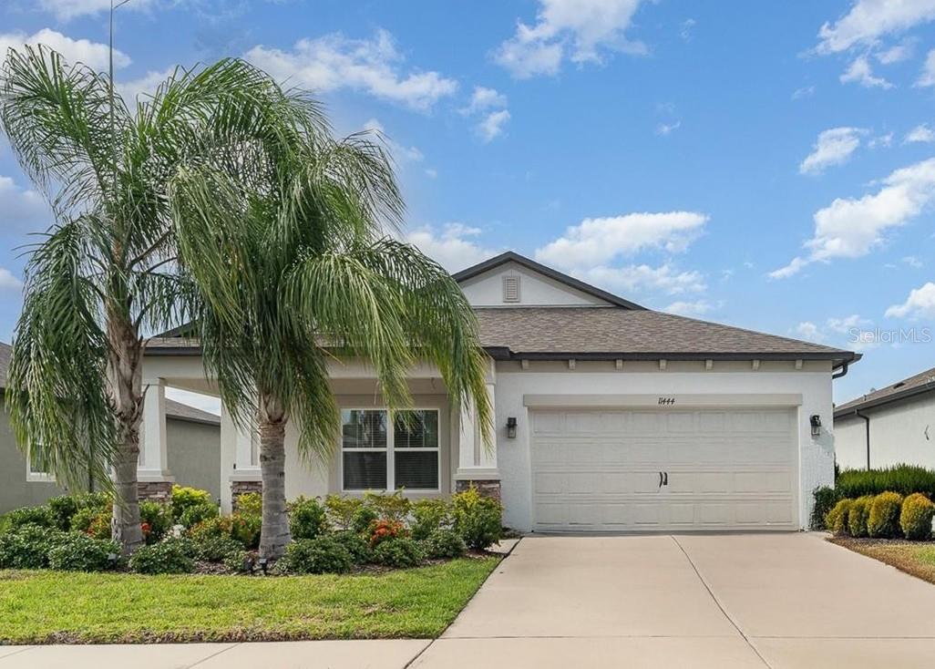 *** Additional Photos will be added on July 29th *** Take advantage of lower payments with the ASSUMABLE LOAN at a fixed interest rate. This M/I-built Picasso floor plan offers 3 bedrooms, 2 baths, and a 2-car garage, along with a large den/flex room, in a close-knit, peaceful community where neighbors support each other. Nearly every type of business owner can be found within the community, too. The open-concept home features a split floor plan. Guest rooms are spacious enough for queen-sized beds. The kitchen is equipped with custom pull-out shelving in the pantry and cabinets, and an Instant Hot heater is installed under the sink. A new GE range will be installed before closing. HVAC was updated with UV in 2022 and is maintained annually. The primary bathroom has a walk-in shower and is handicap accessible. The primary bedroom is extra large and includes a walk-in closet. The north-facing lanai is shaded most of the day, perfect for cookouts or relaxing. The fully fenced yard has full irrigation and planter irrigation systems. The house comes with Kevlar hurricane shutters, enhancing safety and reducing insurance costs. The community center features a gym, large pool, game room, adult recreation area, and rental space. Your mail is securely held at the community center. It's an easy commute to 301 and I-75, MacDill AFB, and Tampa International Airport. Everything you need is within a 3-mile radius, with additional amenities on the way.