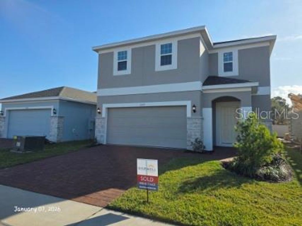 Photo of 1337 Sawgrass Hammock Lane, Davenport, FL 33837 (MLS # O6378614)