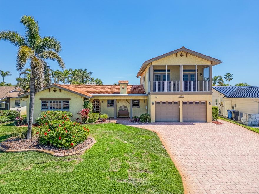 Welcome to this beautiful Mediterranean-style, two-story home offering 2,761 sq ft of well-maintained living space, featuring a split-plan 4 bedrooms and 3.5 baths in the highly desirable South Causeway Yacht Club Estates. This sought-after community is known for its charm and elevation, and this property benefited from that advantage with no water intrusion during last year’s hurricanes. Both the exterior and interior are impeccably maintained, with mature landscaping that perfectly complements the home’s architecture. Step through the glass-panel cathedral-style front door and you’re greeted by stunning bamboo hardwood flooring and a tasteful, inviting color palette. The open floor plan is ideal for entertaining, leading you from a short hallway into a spacious living room with travertine marble flooring and three wood-and-glass French doors opening to the pool area. The gourmet chef’s kitchen is a standout, equipped with stainless steel appliances—including a KitchenAid gas range—granite countertops, a beautifully coordinated backsplash, custom cabinetry, and a generous center island perfect for gatherings. The pool area is a private oasis, surrounded by lush landscaping and featuring a cascading waterfall from the attached spa, along with a heat pump and cooling system replaced in March 2025 (with a 5-year parts warranty). The home offers two options for a primary suite: one on the main level with a new bathroom and walk-in closet, and another upstairs with an elegant bath featuring double vanities, a stone-and-glass shower, two walk-in closets, and French doors leading to a private screened porch. Two additional guest bedrooms are thoughtfully split from the primary spaces, with one offering direct access to the pool. The laundry room includes a cabinet sink, and the oversized two-car garage provides ample storage. Notable upgrades include a new refrigerator (2025), hydro-jetted main water lines (2024), tankless water heater (2022), HVAC system (2017, under warranty through 2027), roofing repair (2022), and thermostat (2024). All windows and French doors are Anderson hurricane-rated, offering peace of mind. This is truly a must-see home in a wonderful community.