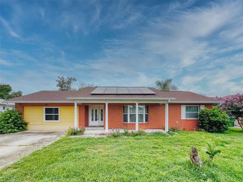Photo of 2125 E Parkton Drive, Deltona, FL 32725 (MLS # V4950911)